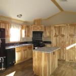 1215 - kitchen with hickory cabinets presented by Recreational Resort Cottages and Cabins, Rockwall, Texas. Athensparkhomes.net