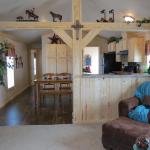 Athens Park Homes cabin with Ranch Style Package and Crows Foot beam on display at Recreational Resort Cottages and Cabins in Rockwall, Texas